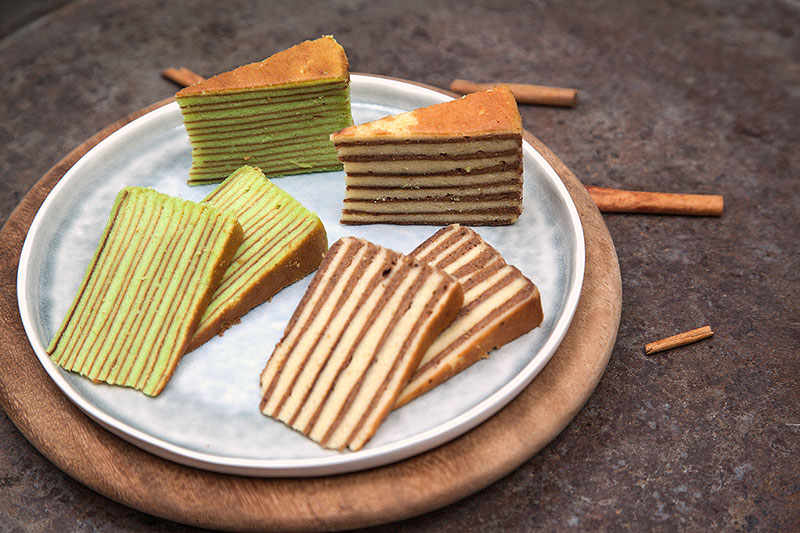 De geschiedenis van spekkoek: een Nederlands-Indonesische lekkernij